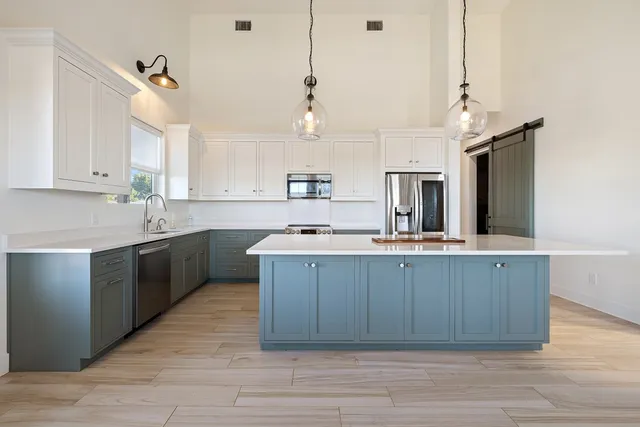 a view of a city with lush green forest