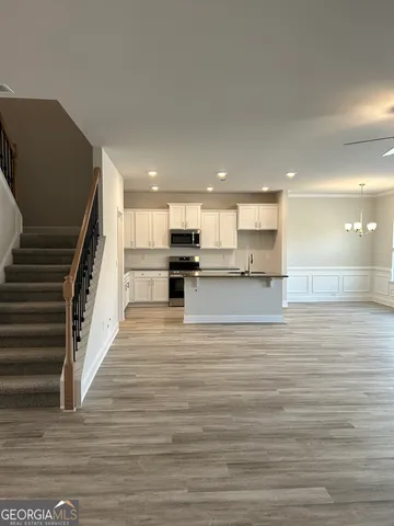 a view of kitchen and kitchen island