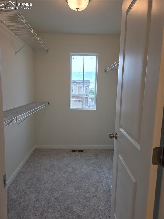 5356 Truscott Road Colorado Springs, CO 80925 - Photo 11 of 16 a view of an empty room with a window