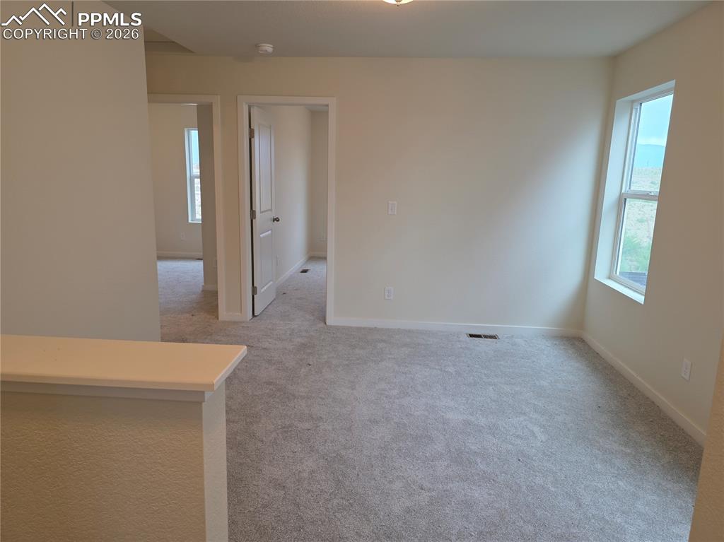 5356 Truscott Road Colorado Springs, CO 80925 - Photo 8 of 16 a view of an empty room