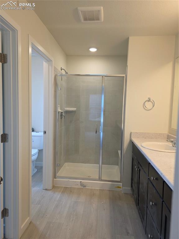 5356 Truscott Road Colorado Springs, CO 80925 - Photo 10 of 16 a bathroom with a shower and a sink