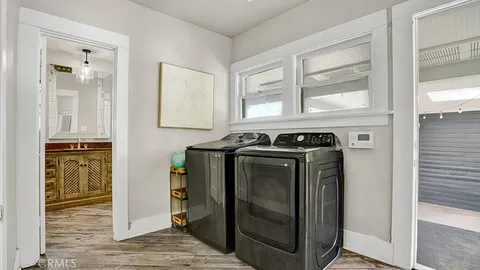 a utility room with washer and dryer