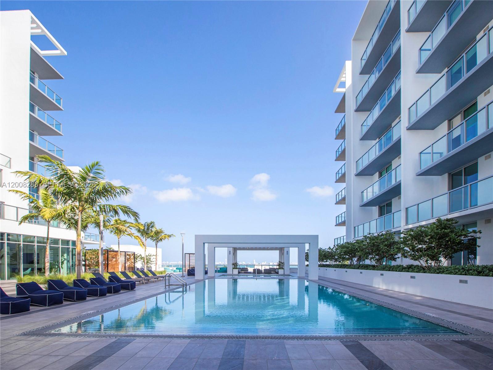 3900 Biscayne Boulevard, Unit S906 Miami, FL 33137 - Photo 11 of 17 a view of a building with garden