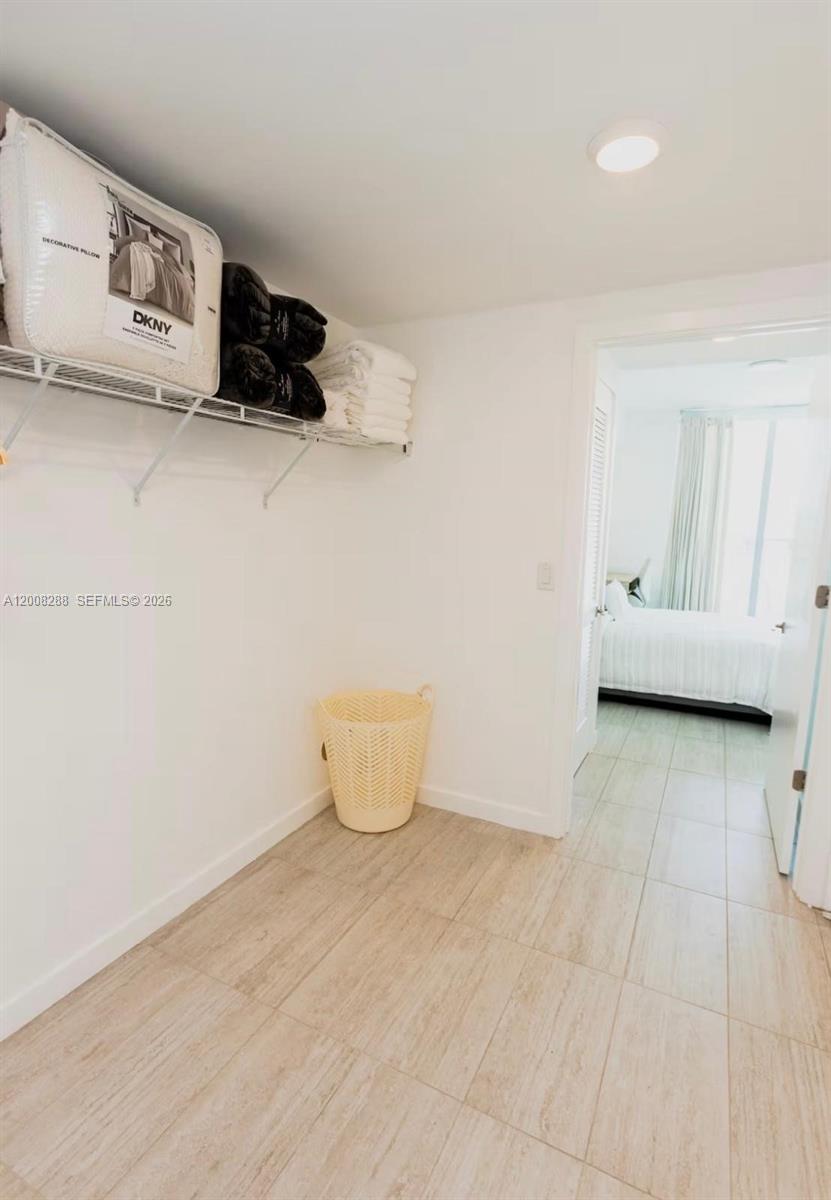3900 Biscayne Boulevard, Unit S906 Miami, FL 33137 - Photo 8 of 17 a view of empty room with windows