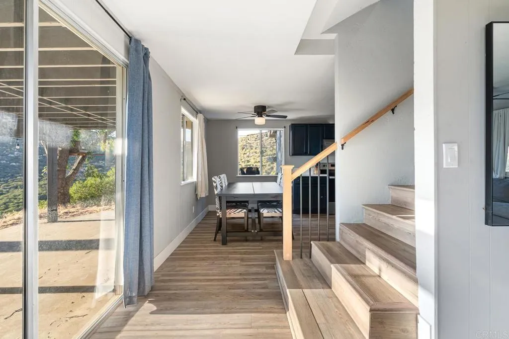 26086 Bear Valley Heights Road Valley Center, CA 92082 - Photo 57 of 65 a view of entryway and hall with wooden floor
