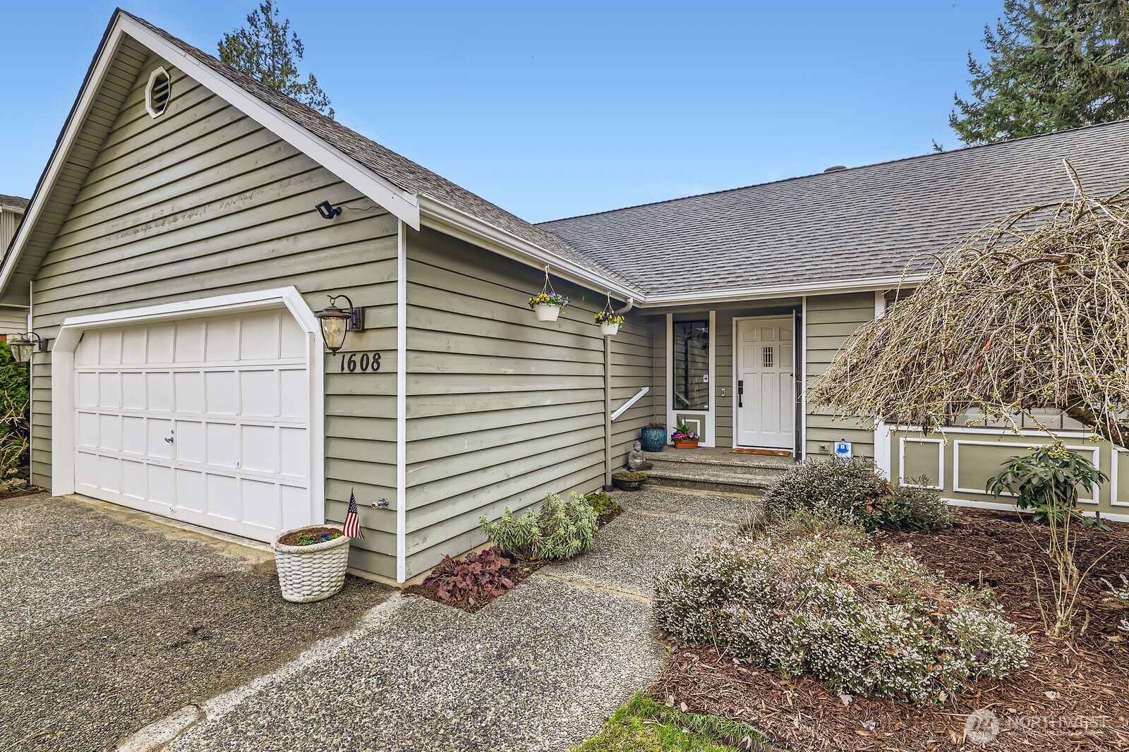 1608 243rd Place Southeast Bothell, WA 98021 - Photo 3 of 33 a view of house with backyard space and garden