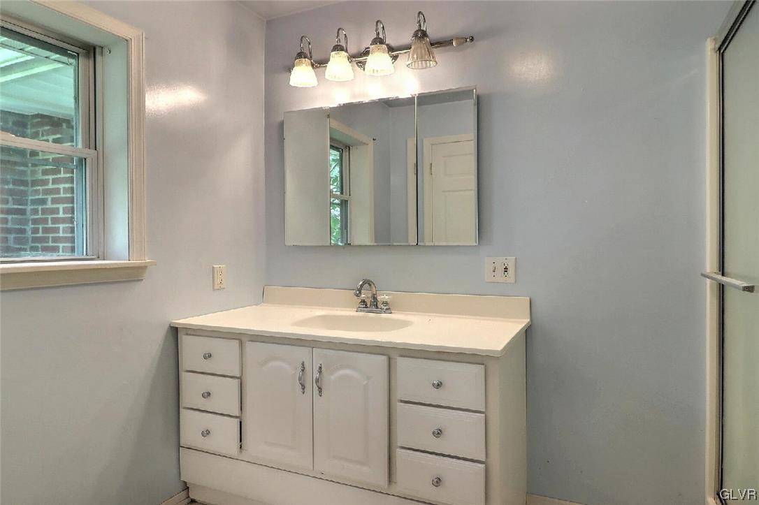122 James Lane Stroudsburg, PA 18360 - Photo 14 of 50 a bathroom with a sink vanity and mirror