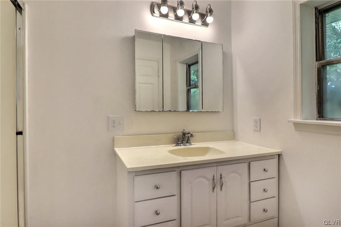 122 James Lane Stroudsburg, PA 18360 - Photo 17 of 50 a bathroom with a sink and a mirror