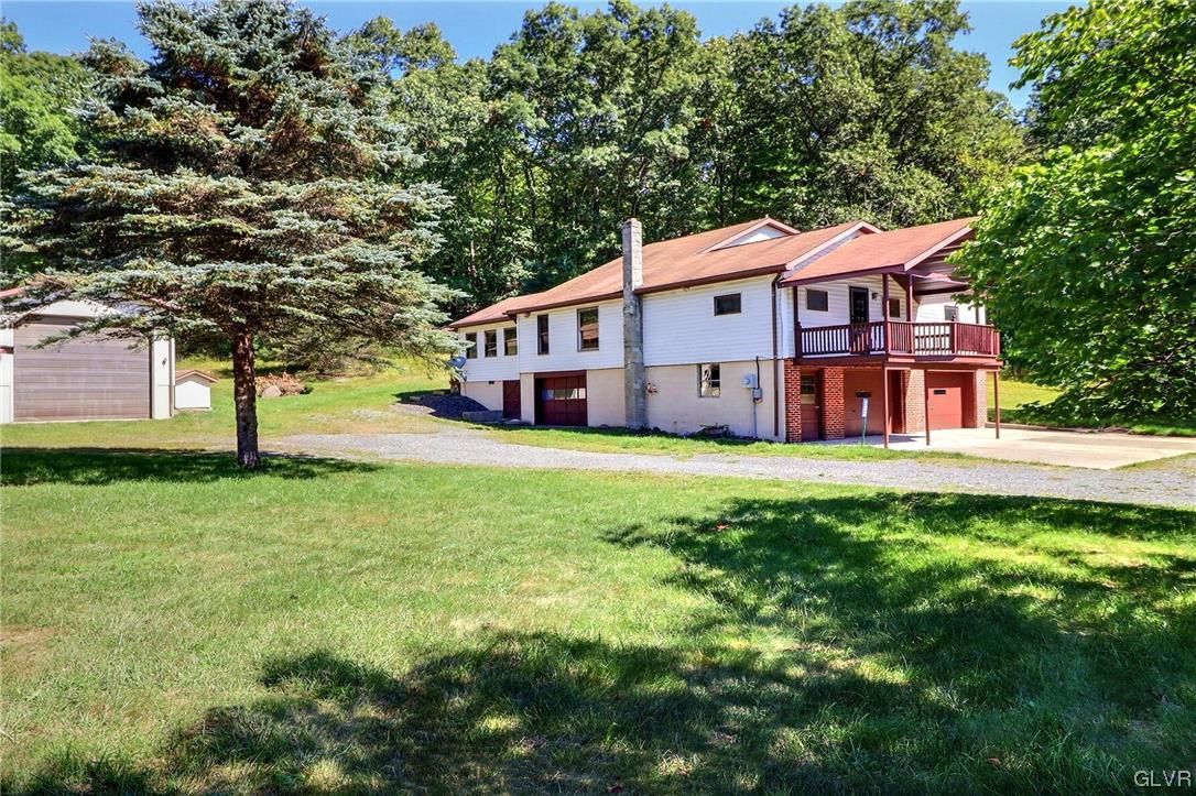 122 James Lane Stroudsburg, PA 18360 - Photo 28 of 50 a view of a house with a big yard plants and large trees