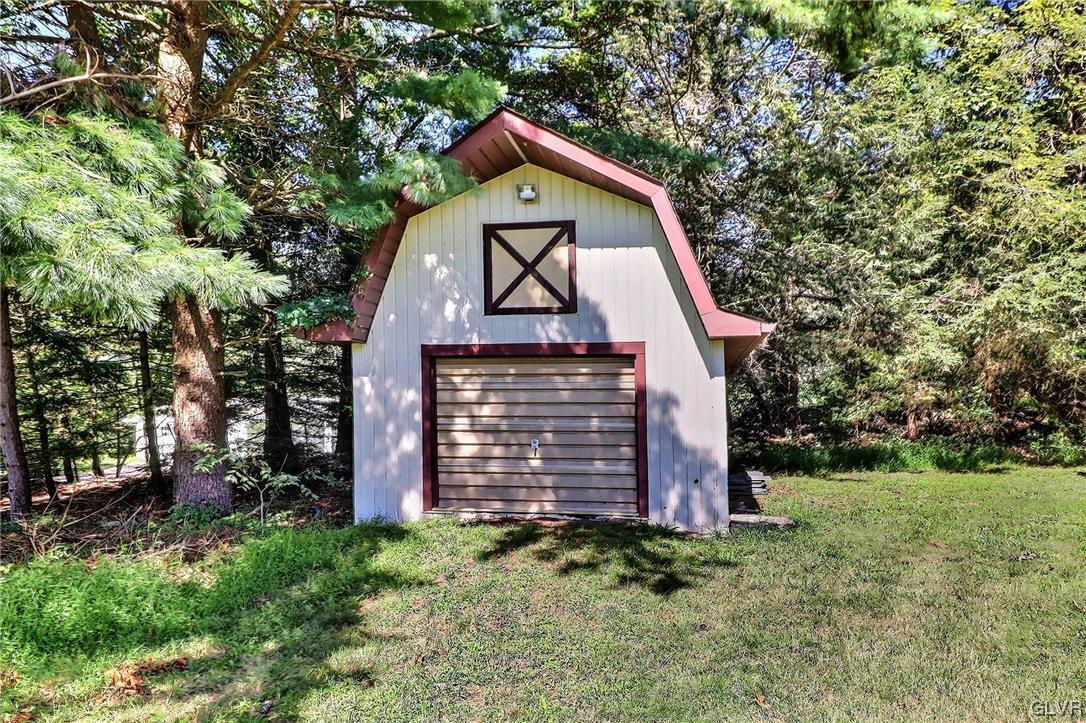 122 James Lane Stroudsburg, PA 18360 - Photo 50 of 50 a front view of a house with a yard