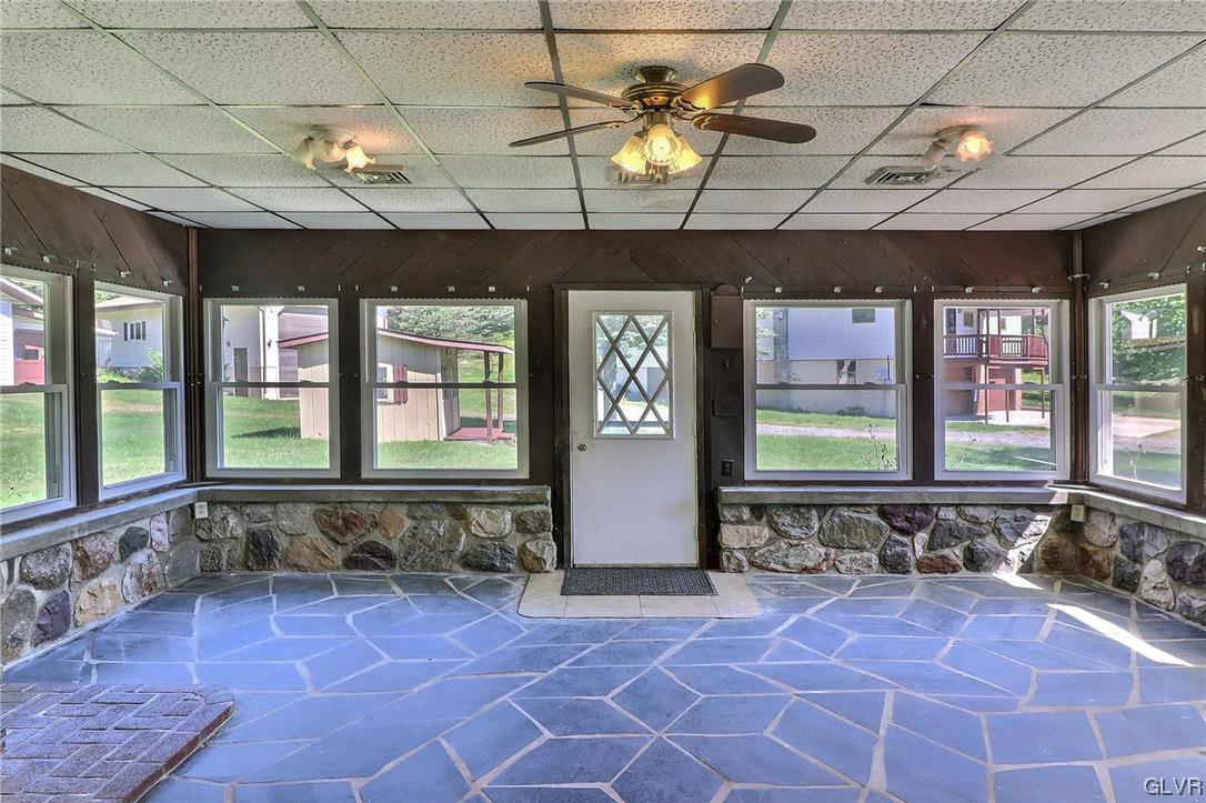 122 James Lane Stroudsburg, PA 18360 - Photo 10 of 50 a large room with a large window and furniture