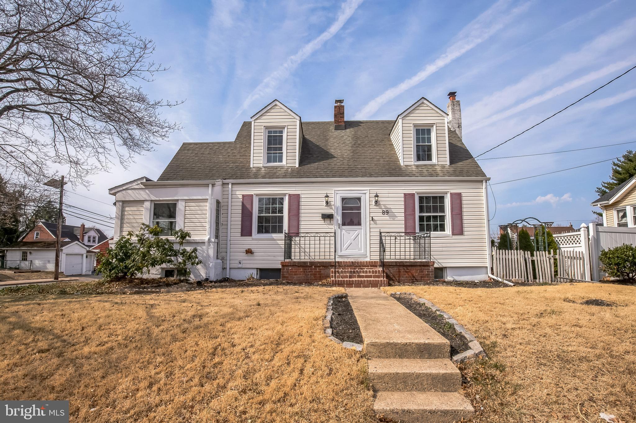 89 Reed Avenue Hamilton, NJ 08610 - Photo 1 of 30 a front view of a house with a yard