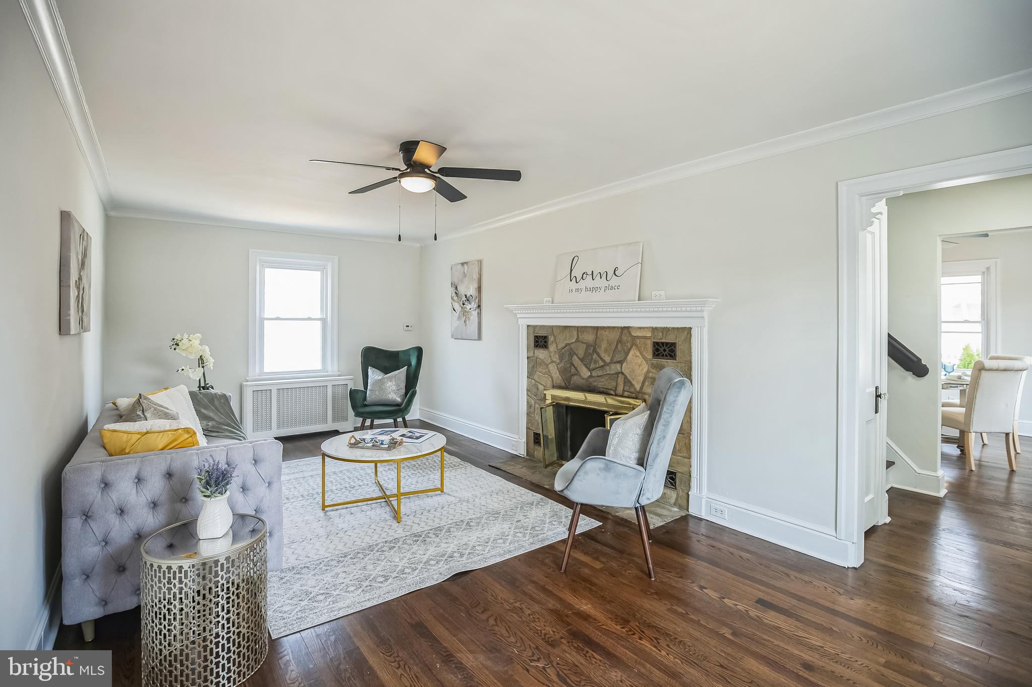 89 Reed Avenue Hamilton, NJ 08610 - Photo 15 of 30 a living room with furniture and a fireplace