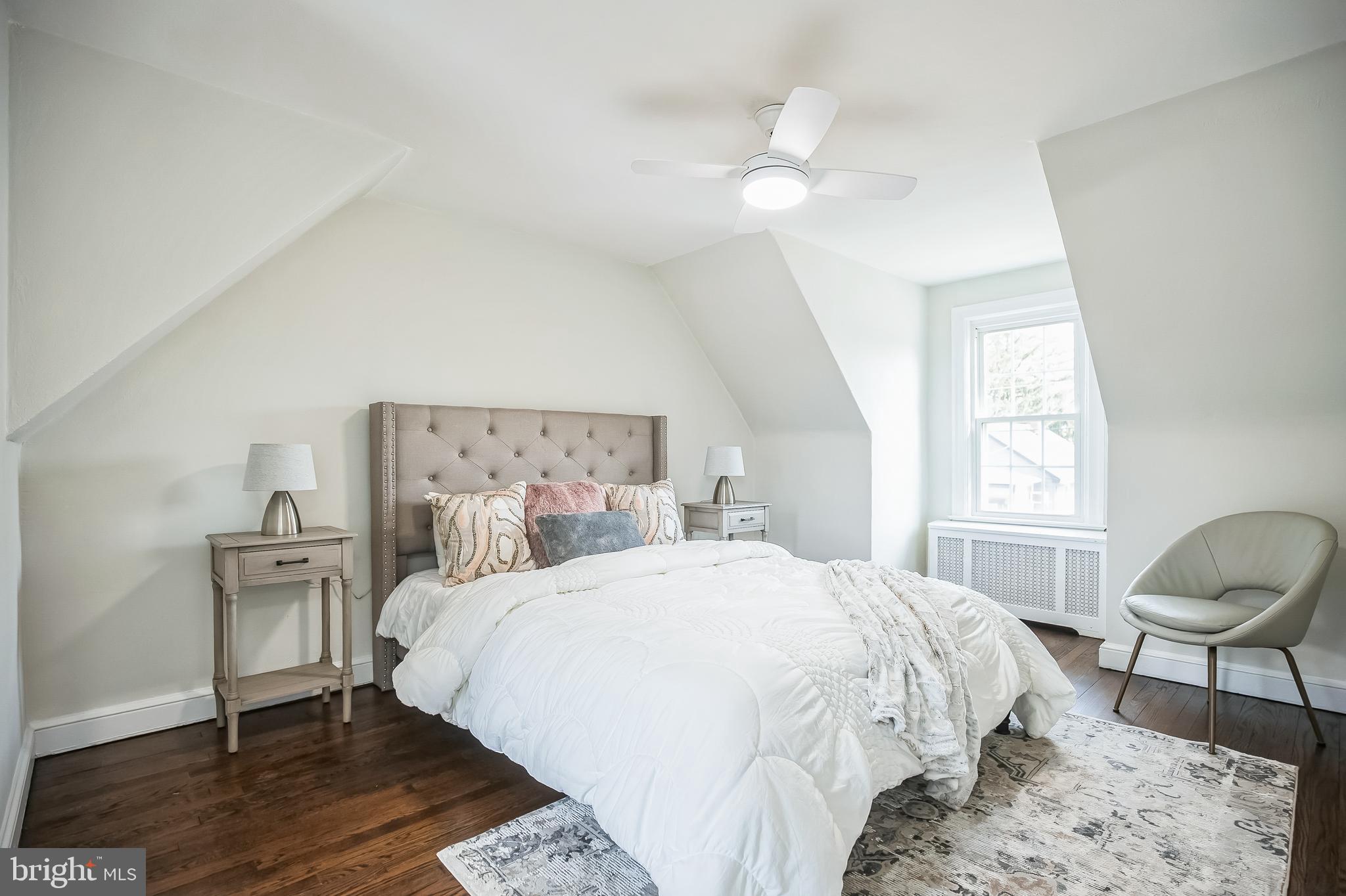 89 Reed Avenue Hamilton, NJ 08610 - Photo 19 of 30 a bedroom with a bed and a chair