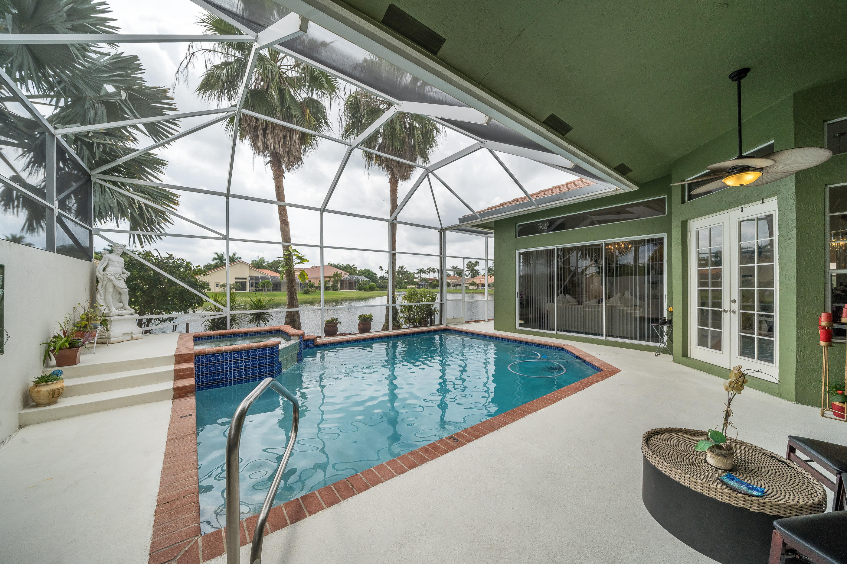 10870 Haydn Drive Boca Raton, FL 33498 - Photo 38 of 49 Screened Patio w/Pool