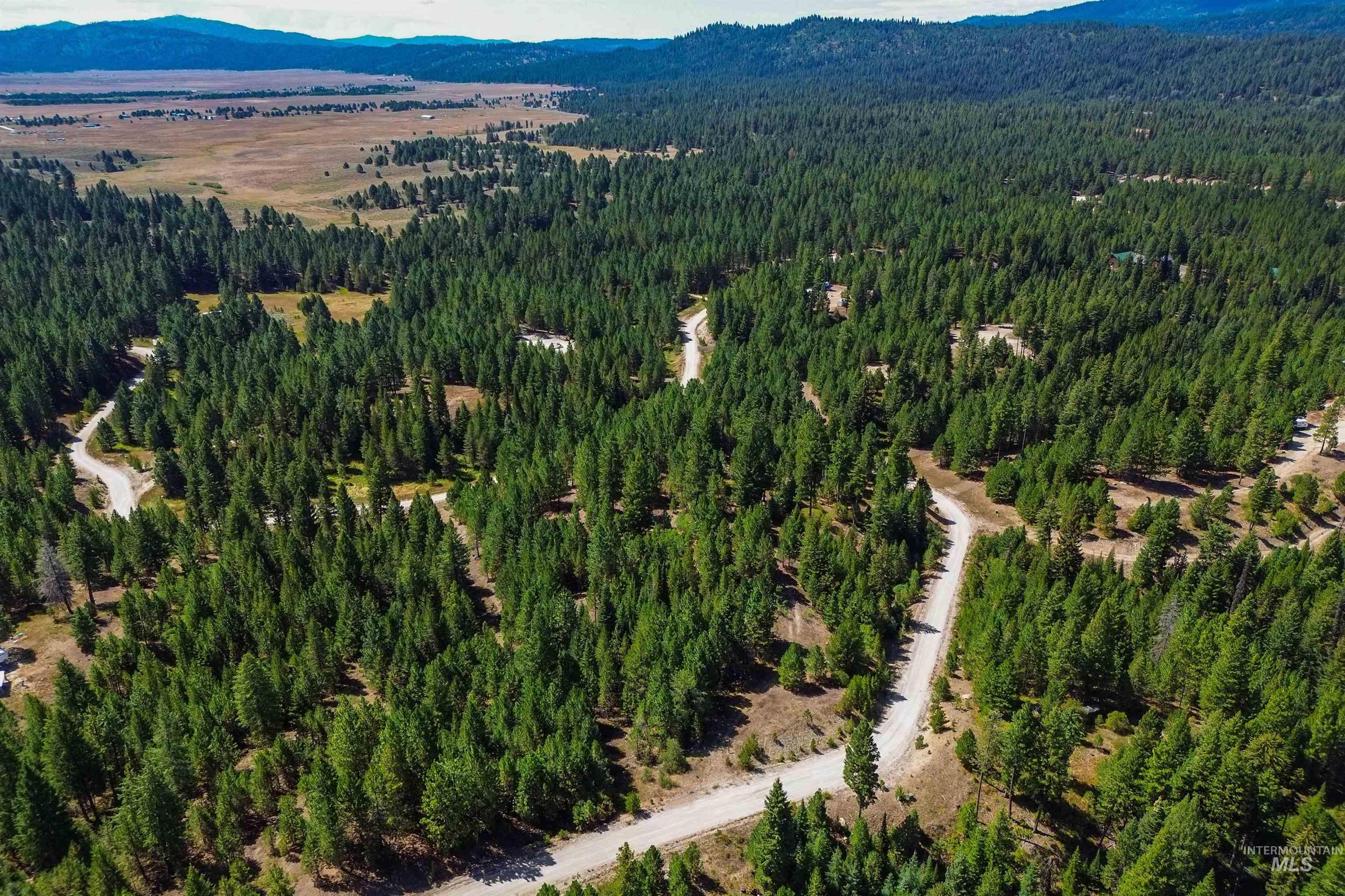 47 Coit Drive Cascade, ID 83611 - Photo 17 of 34 Drone / aerial view of a mountain backdrop