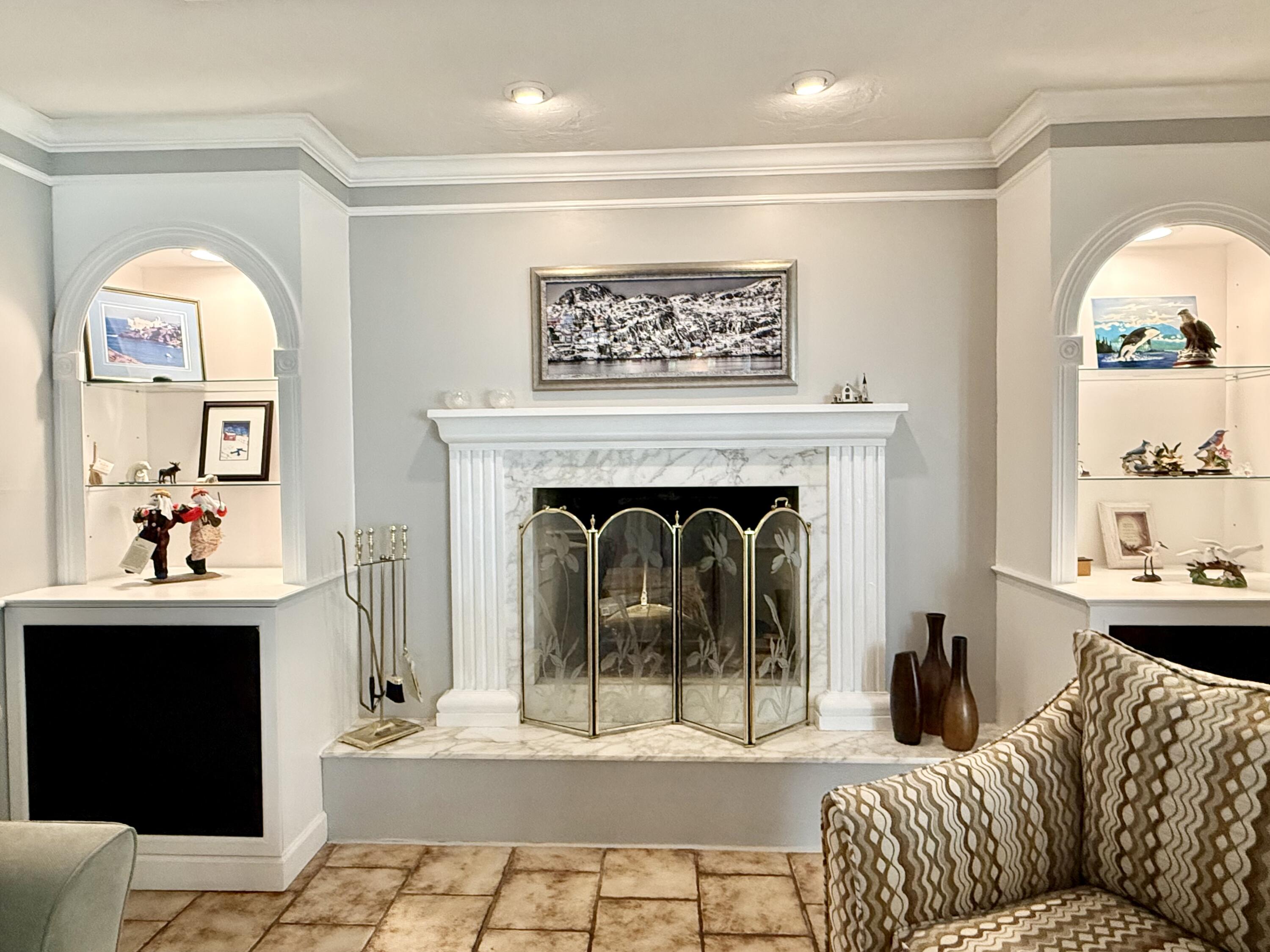 16283 Alexander Run Jupiter, FL 33478 - Photo 20 of 96 a living room with furniture and a fireplace