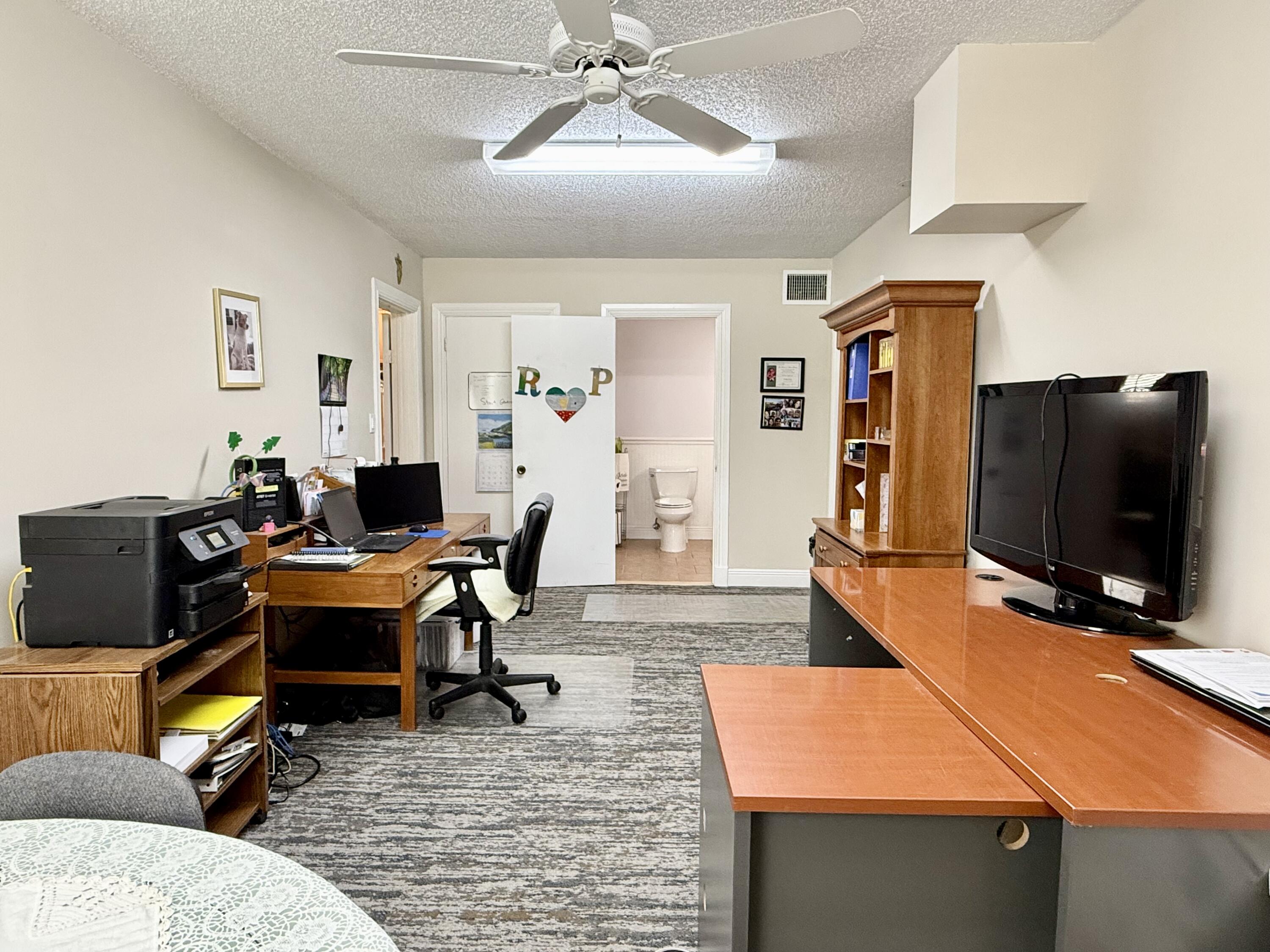 16283 Alexander Run Jupiter, FL 33478 - Photo 33 of 96 a view of a workspace with furniture