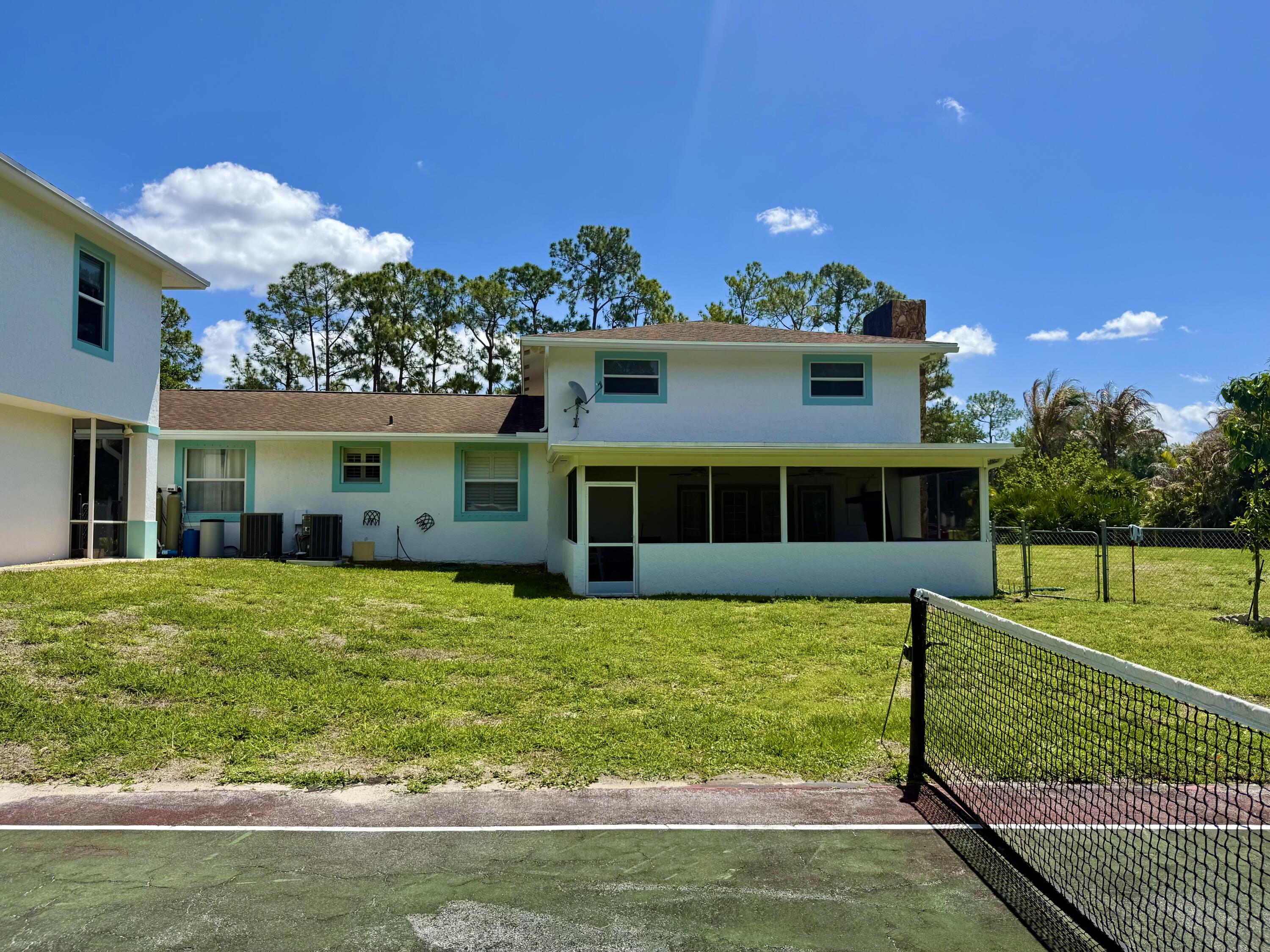16283 Alexander Run Jupiter, FL 33478 - Photo 6 of 14 Main House Rear