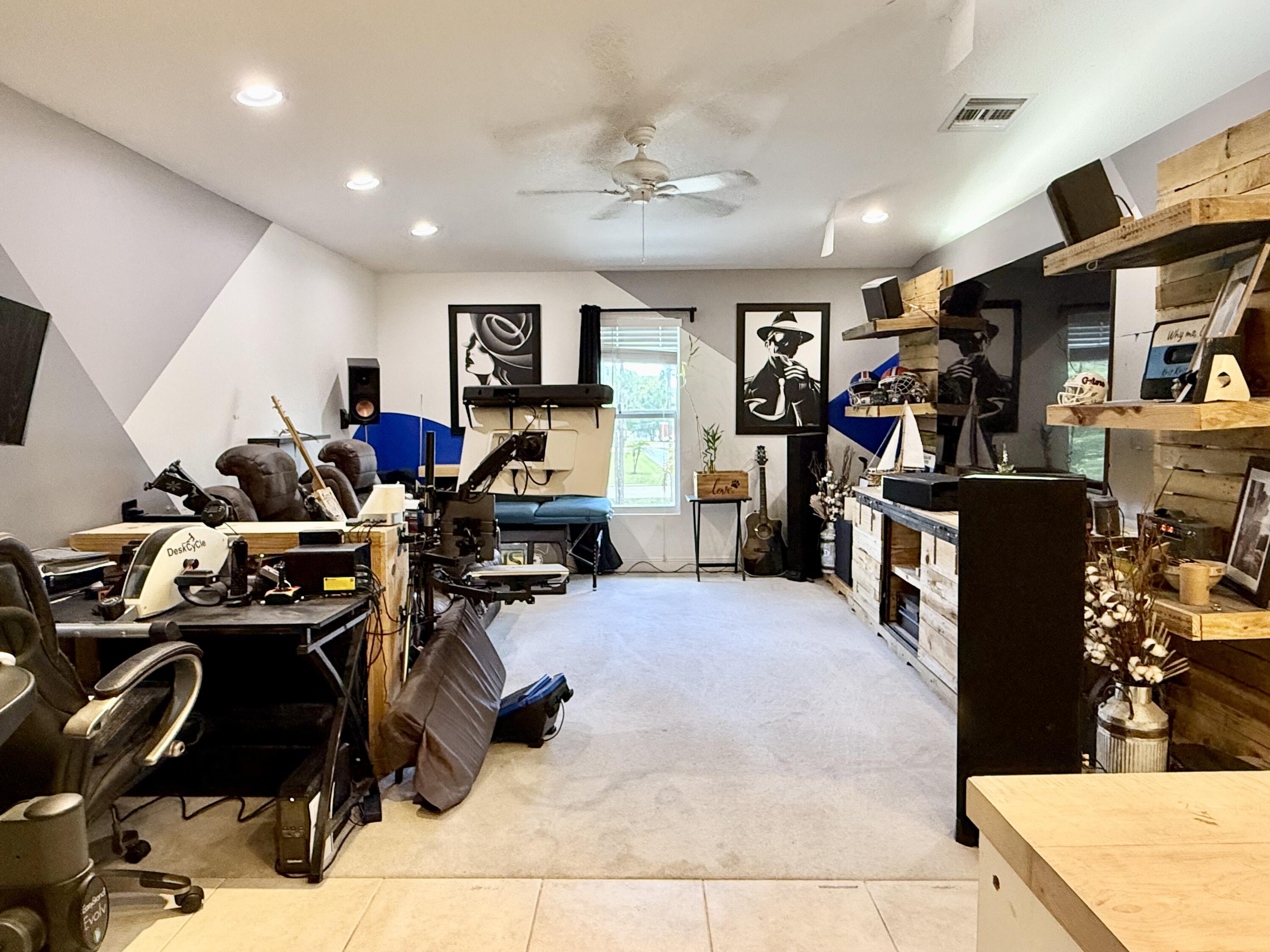 16283 Alexander Run Jupiter, FL 33478 - Photo 66 of 96 a view of a workspace with furniture