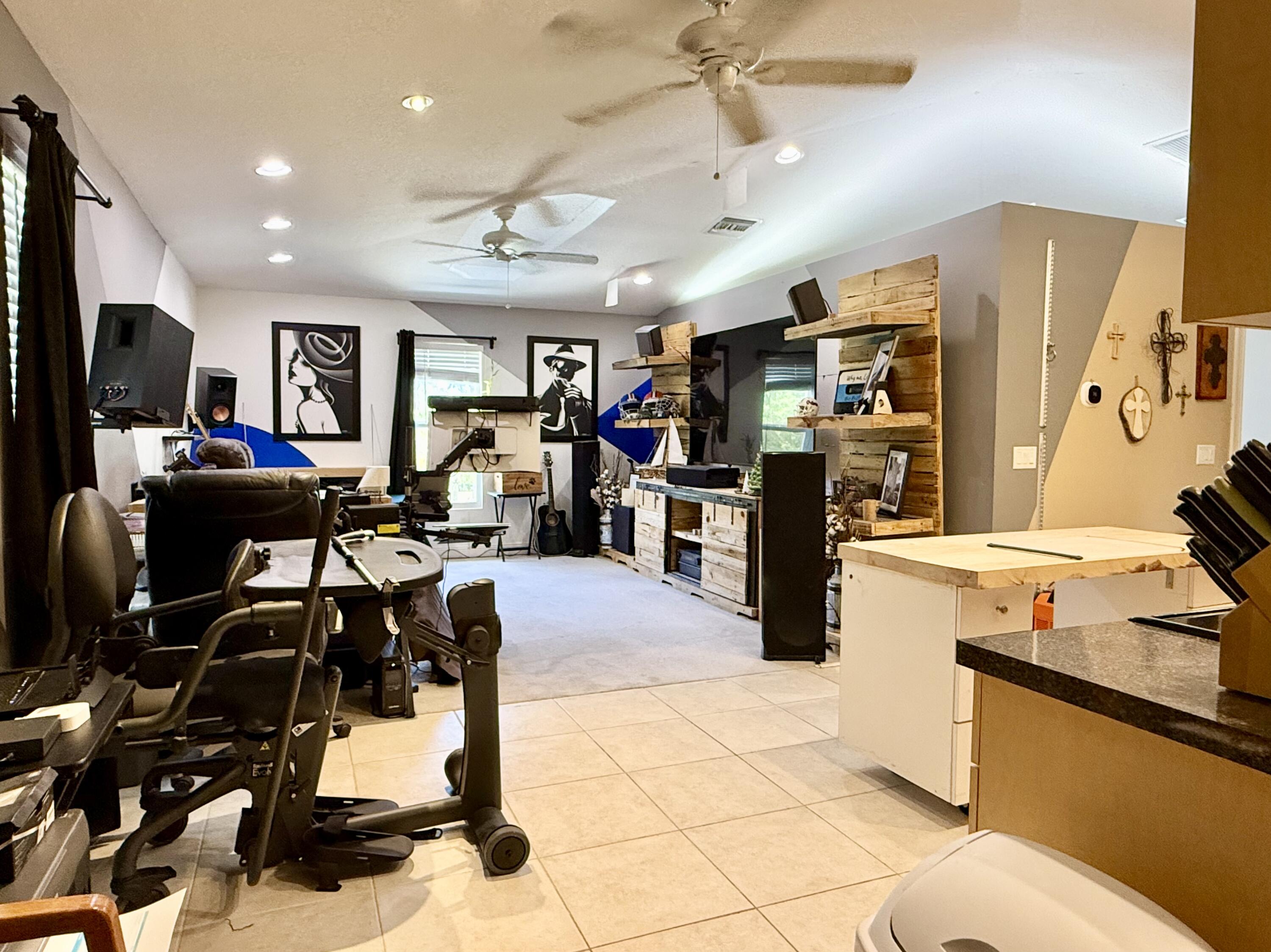 16283 Alexander Run Jupiter, FL 33478 - Photo 67 of 96 a view of a kitchen with workspace and a window