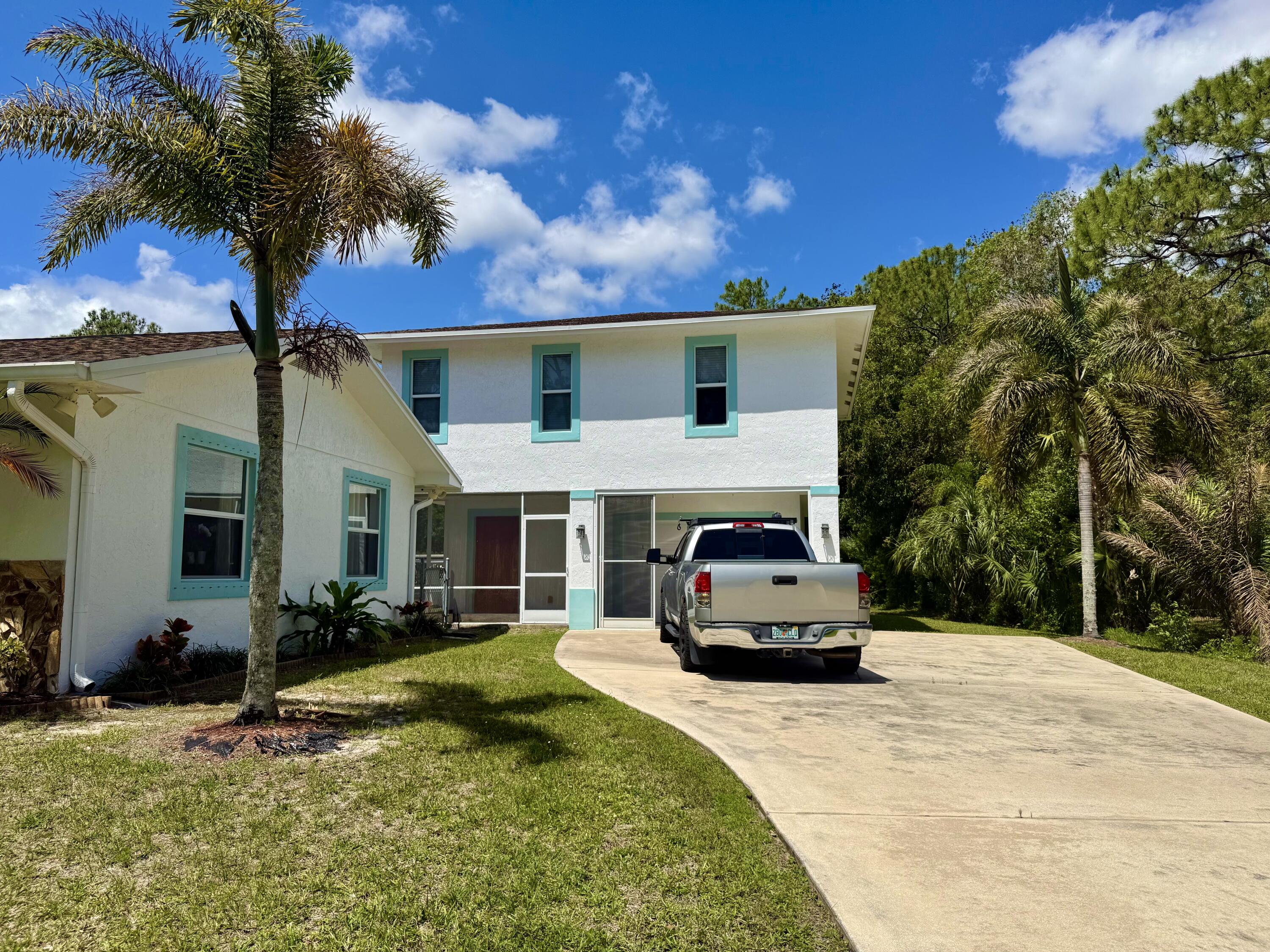 16283 Alexander Run Jupiter, FL 33478 - Photo 9 of 14 Driveway Guest House