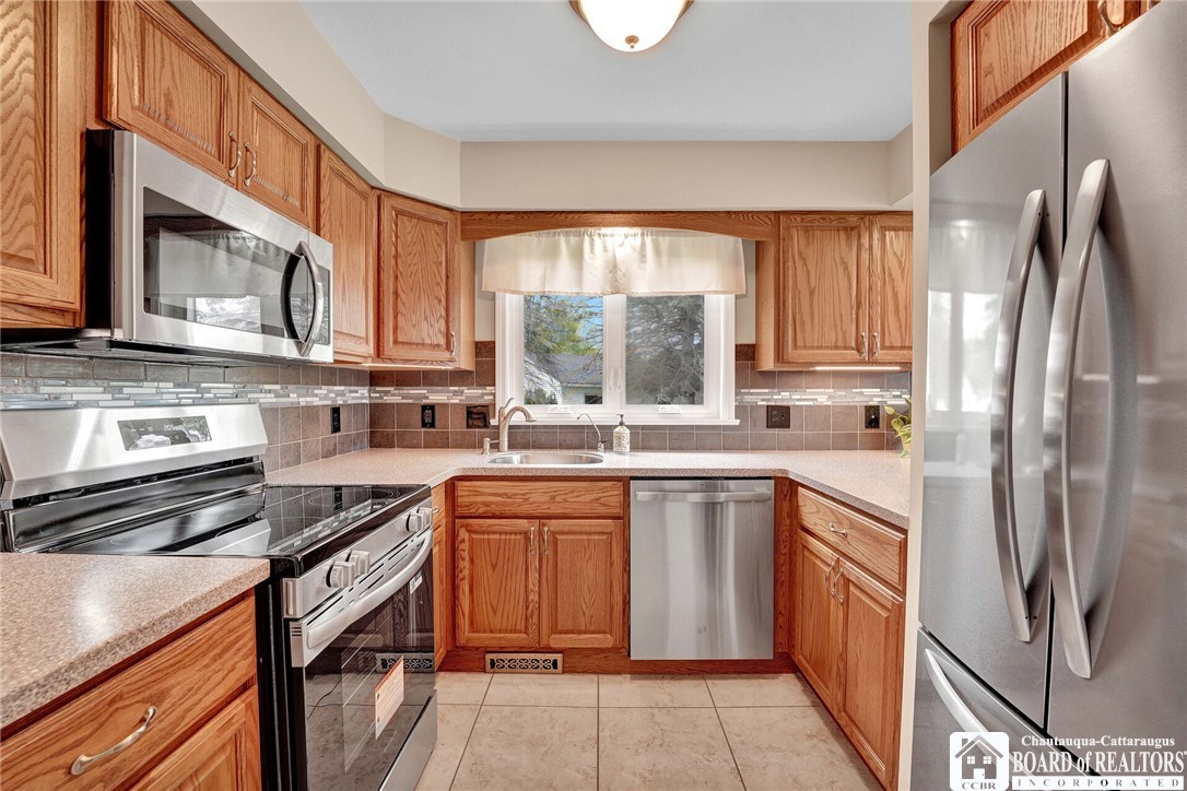 4406 West Lake Road, Unit 24 Chautauqua, NY 14757 - Photo 9 of 42 Updated oak kitchen with new appliances with Exten