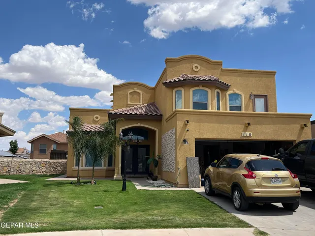 a house view with a garden space