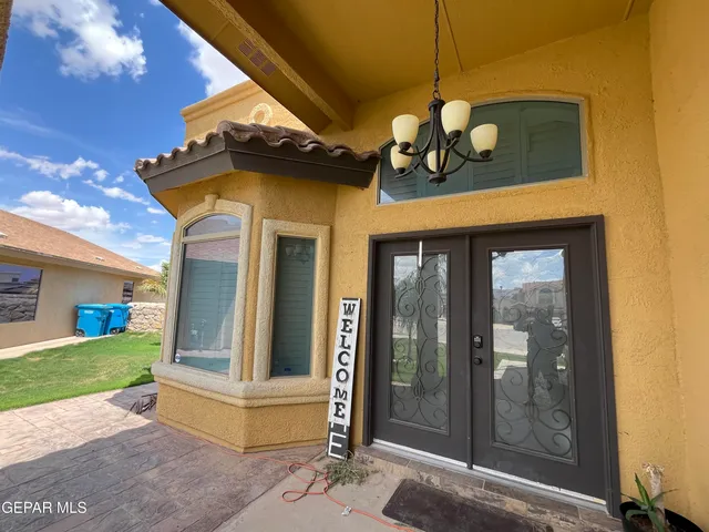 a view of a entryway door front of house