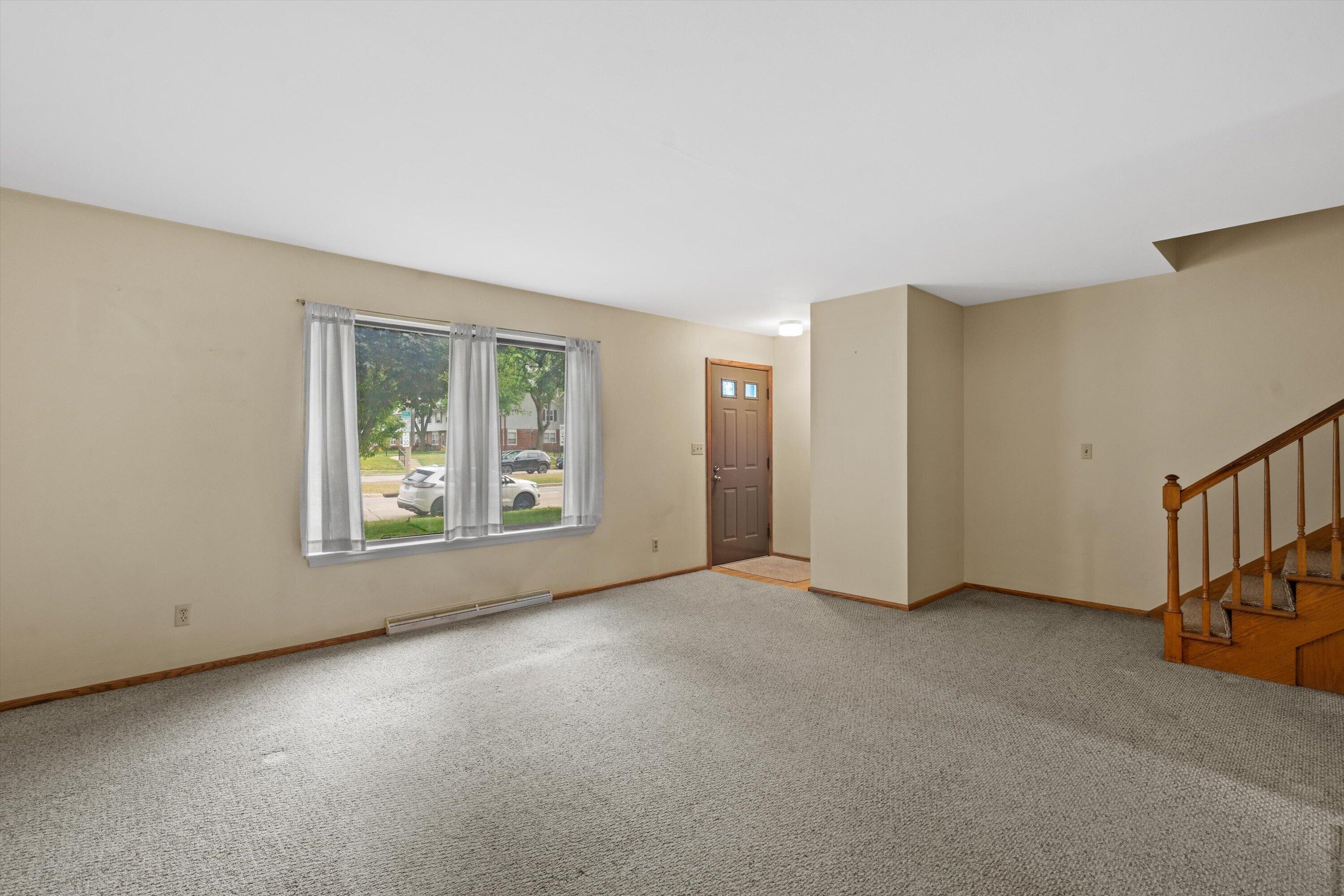 9903 Beloit Road, Unit F10 Milwaukee, WI 53227 - Photo 6 of 30 06-Living Room