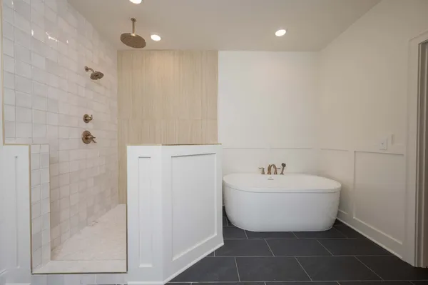a bathroom with a double vanity sink and mirror