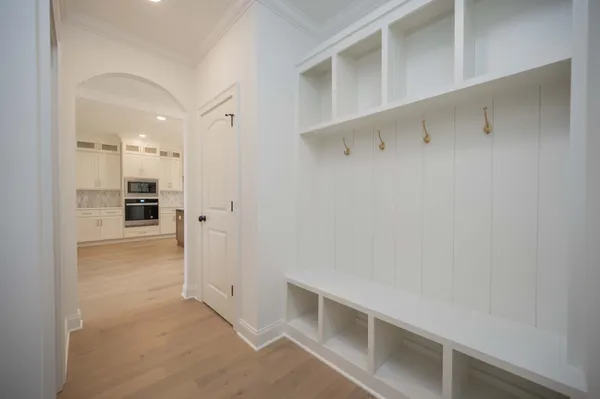 a view of a bathroom from a hallway