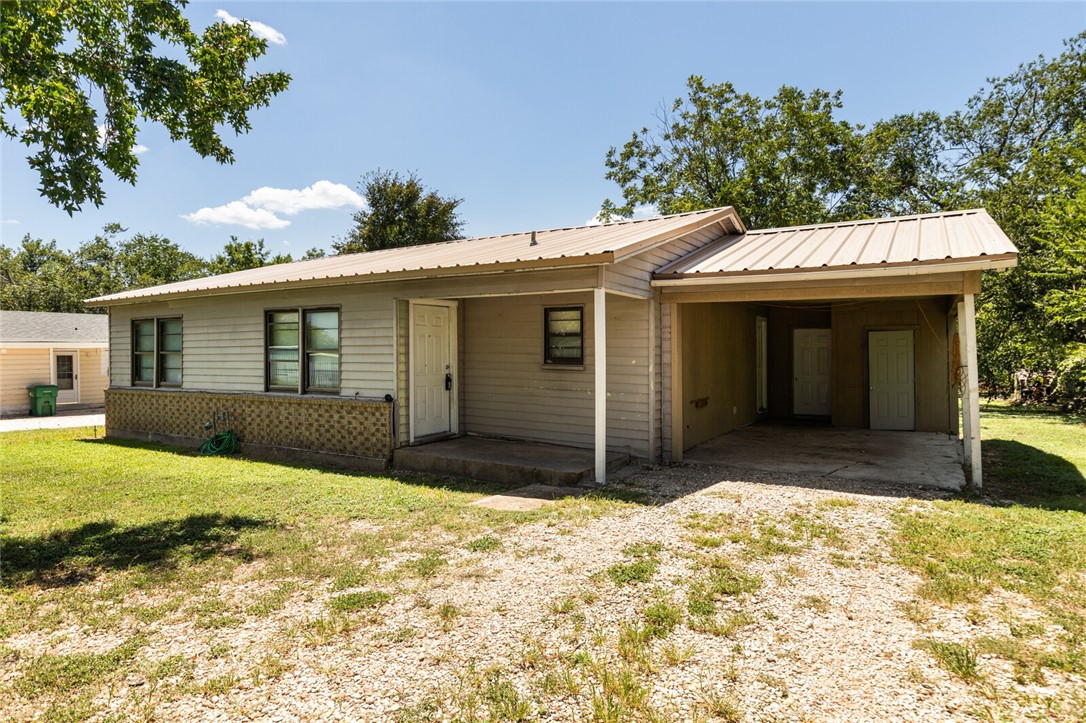 1211 South Old Robinson Road Robinson, TX 76706 - Photo 6 of 26 a front view of a house with a yard and garage