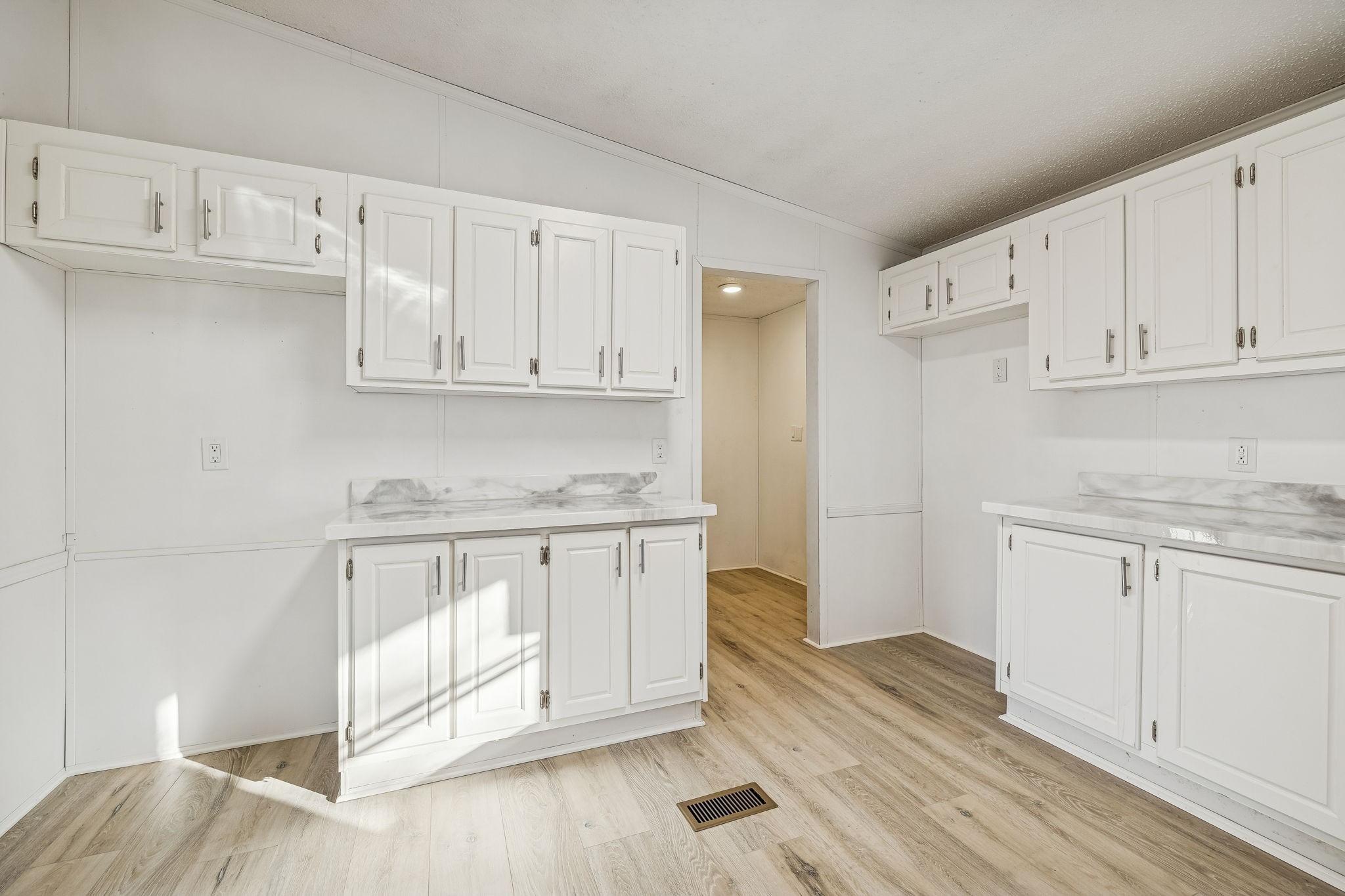 145 Milk Barn Road Cookeville, TN 38506 - Photo 16 of 43 a kitchen with granite countertop white cabinets and white appliances