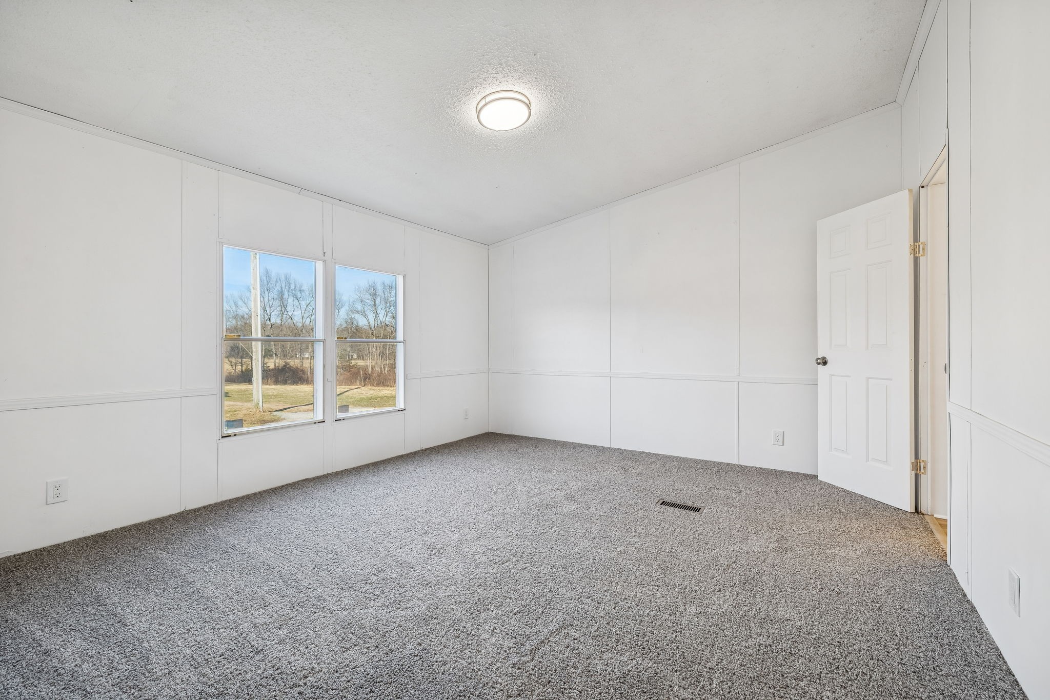 145 Milk Barn Road Cookeville, TN 38506 - Photo 17 of 43 an empty room with a window