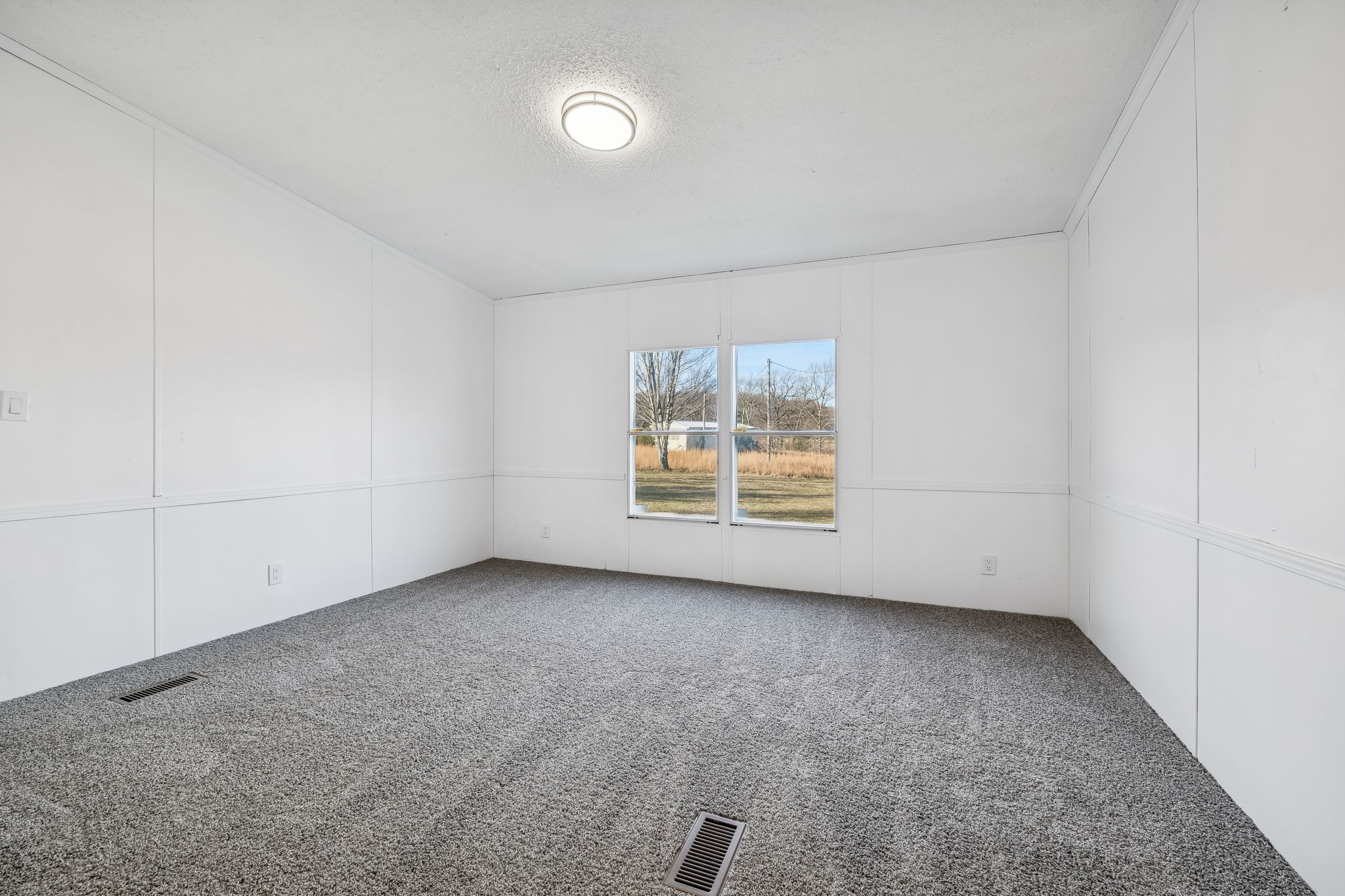 145 Milk Barn Road Cookeville, TN 38506 - Photo 18 of 43 an empty room with windows