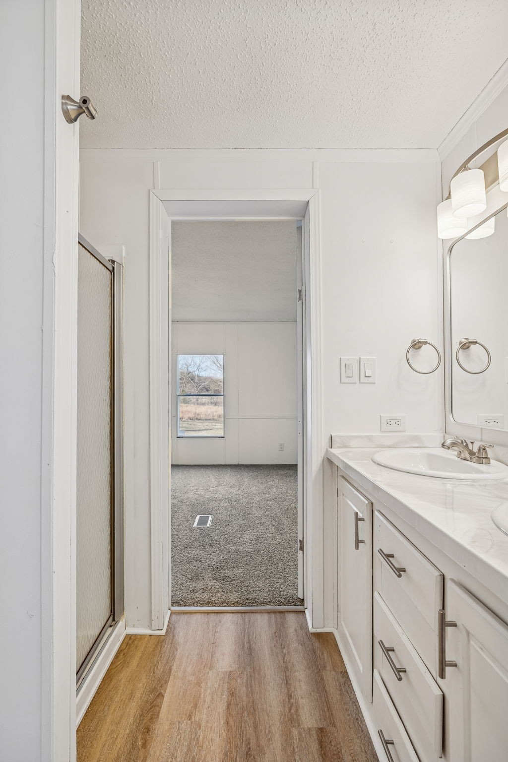 145 Milk Barn Road Cookeville, TN 38506 - Photo 22 of 43 a bathroom with a sink and a mirror