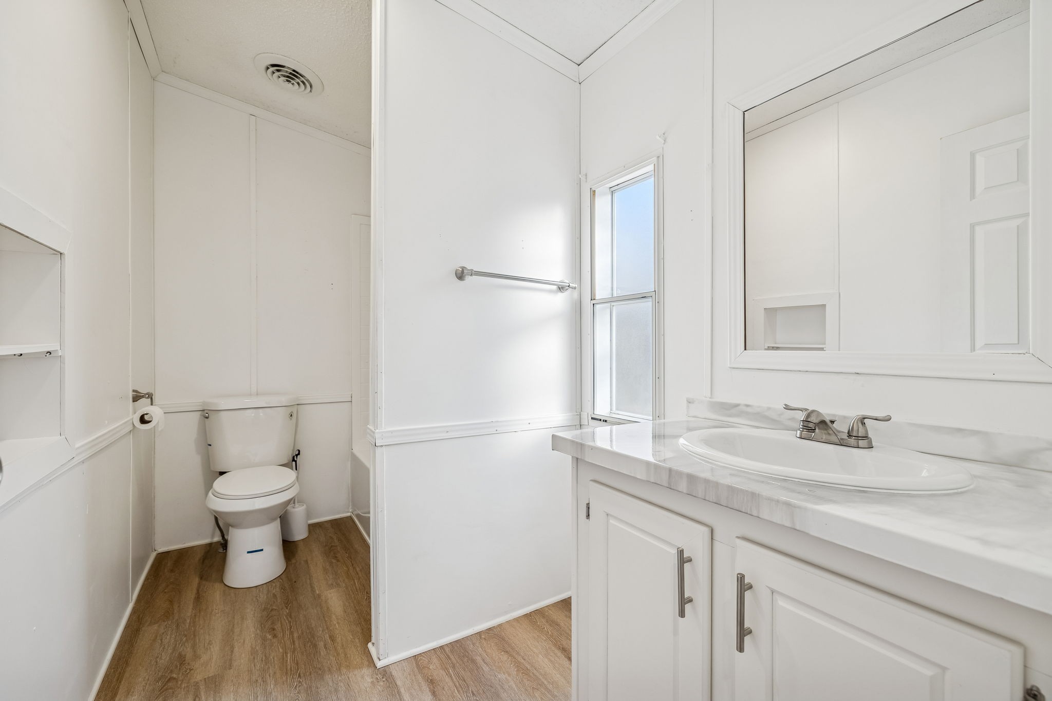 145 Milk Barn Road Cookeville, TN 38506 - Photo 27 of 43 a bathroom with a sink and a toilet