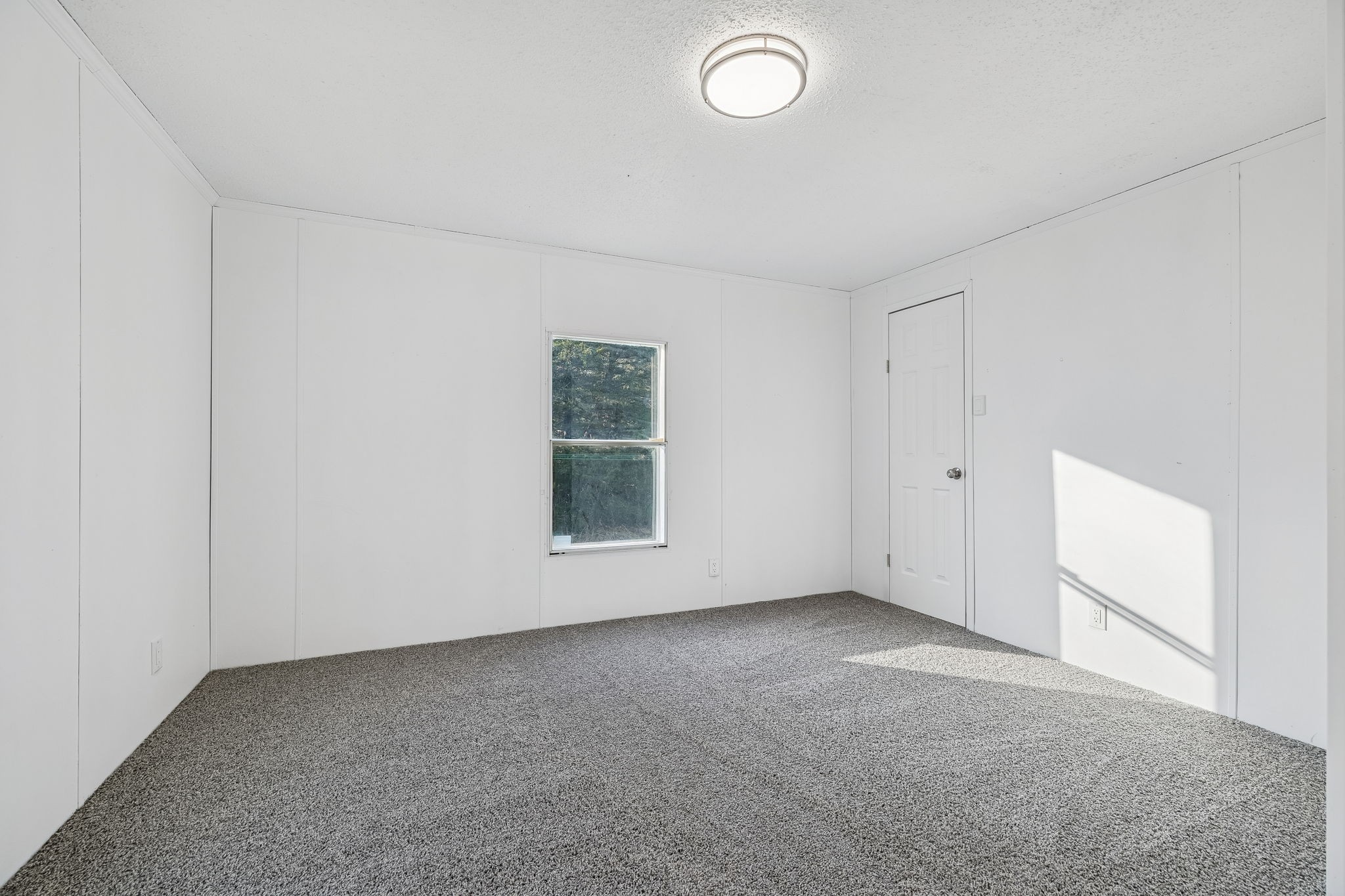 145 Milk Barn Road Cookeville, TN 38506 - Photo 28 of 43 an empty room with windows