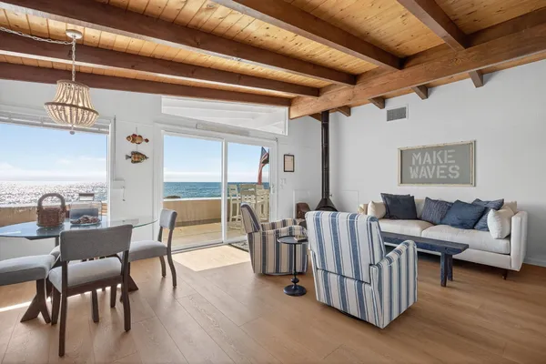 a living room with furniture and a table