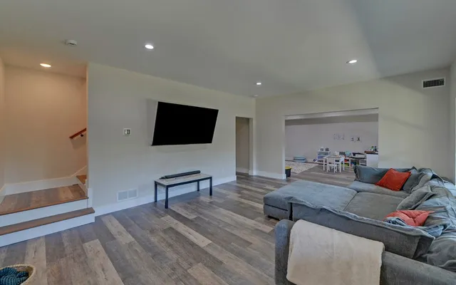 a view of a livingroom with wooden floor
