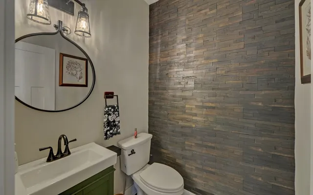 a balcony with furniture and a garden