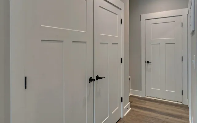 an aerial view of a house with a garden and swimming pool