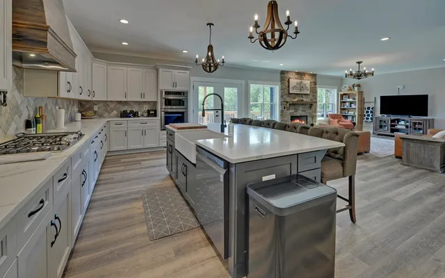 a view of a hallway with entryway wooden floor and front door