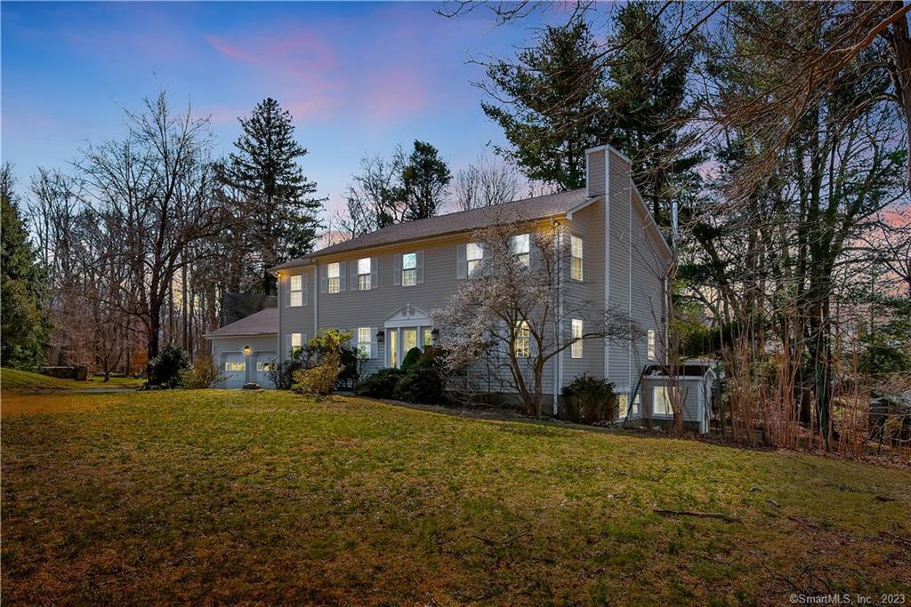 62 Summit Ridge Road Stamford, CT 06902 - Photo 1 of 1 a view of a house with a yard