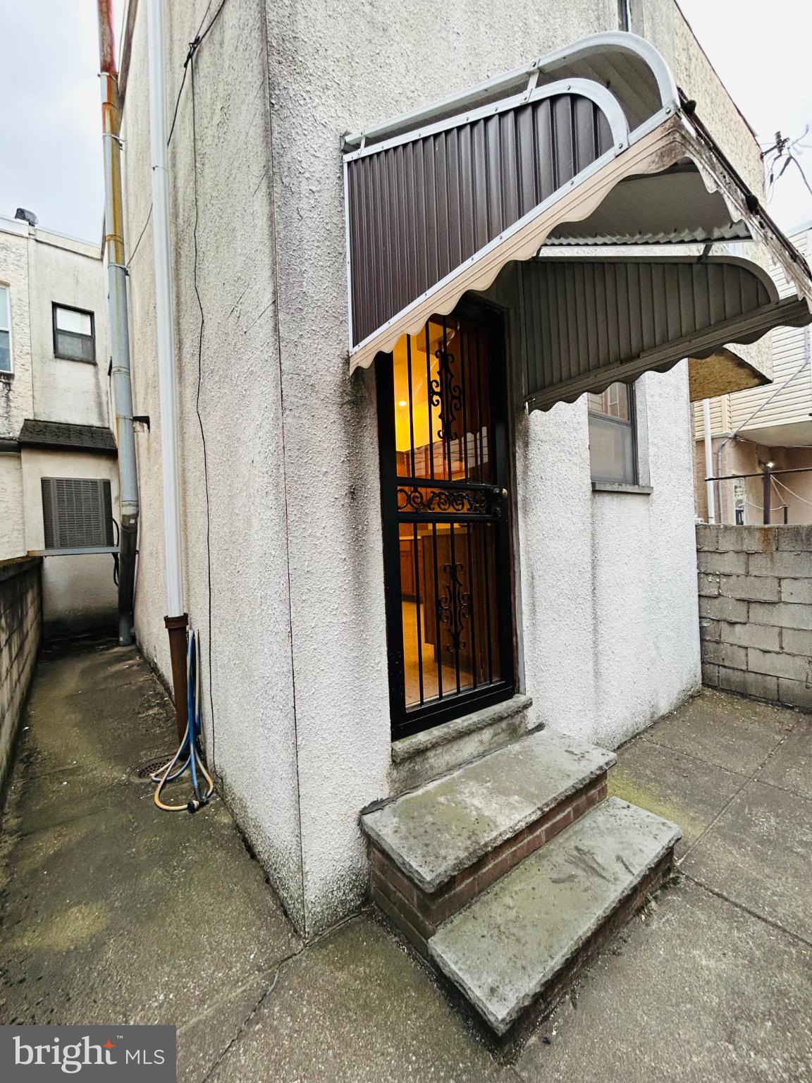 1507 West Shunk Street Philadelphia, PA 19145 - Photo 21 of 31 Charming entrance with inviting glow.