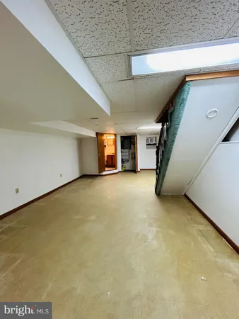 a view of a livingroom with a staircase