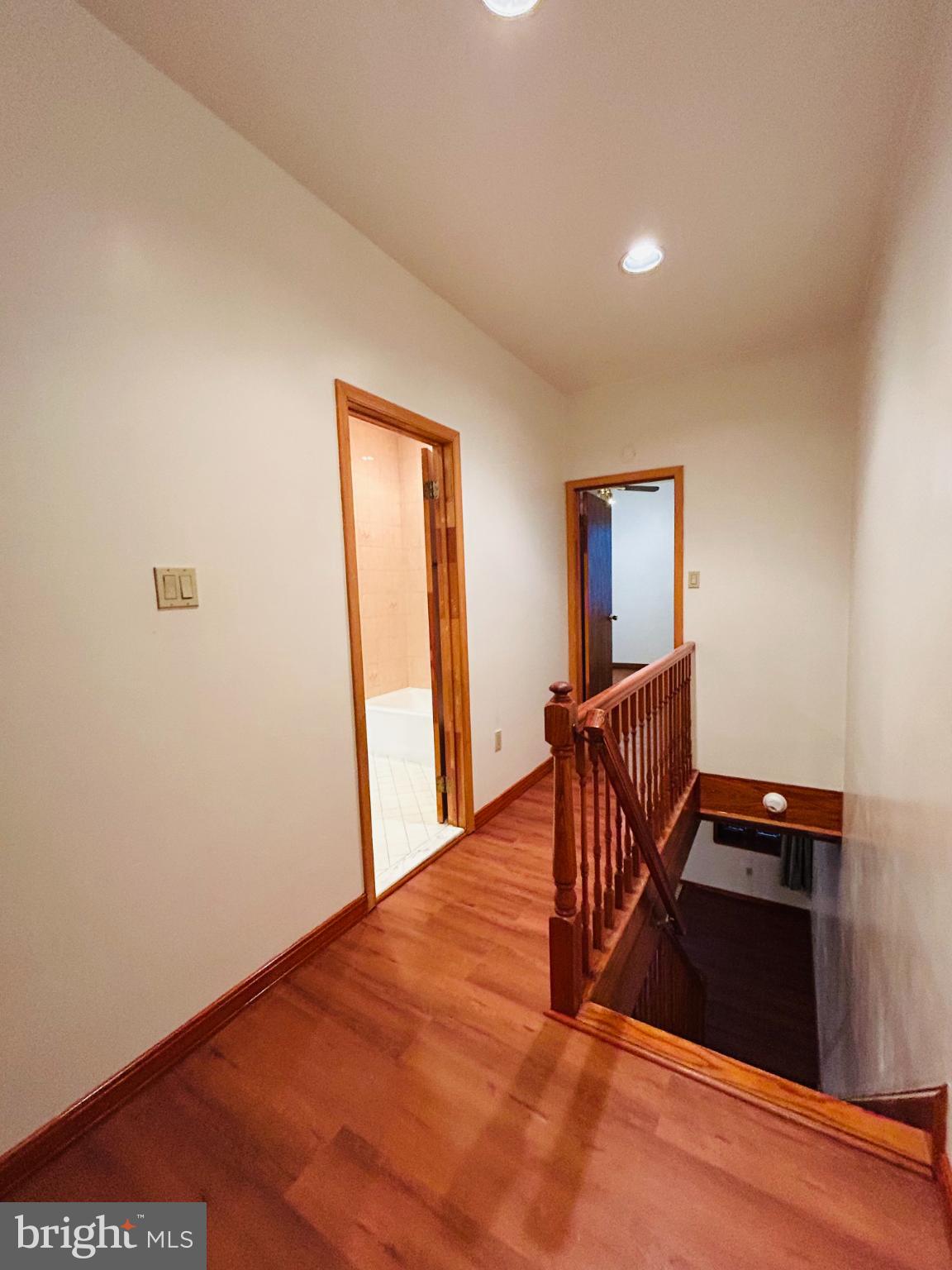 1507 West Shunk Street Philadelphia, PA 19145 - Photo 9 of 31 Inviting hallway with warm wooden accents.