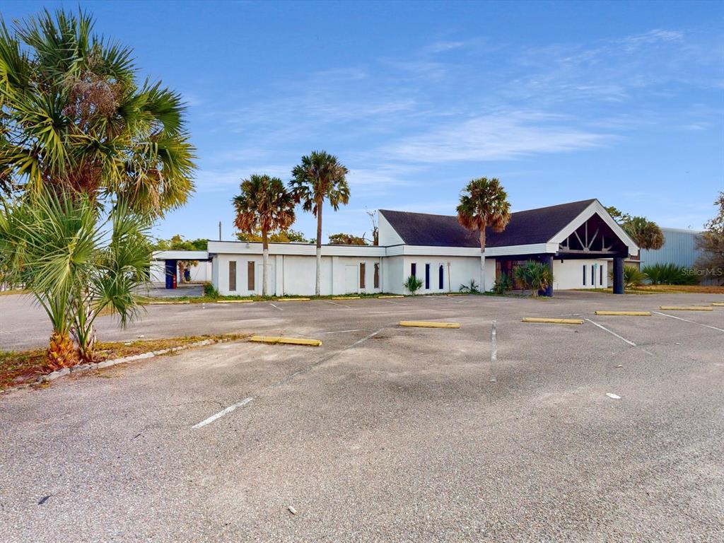 3425 Forsyth Road Winter Park, FL 32792 - Photo 2 of 40 a front view of house with a yard