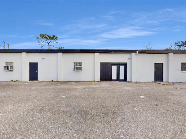 a view of an empty room with a garage